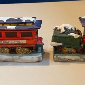 Ceramic Christmas Train. Looks like it was hand painted.